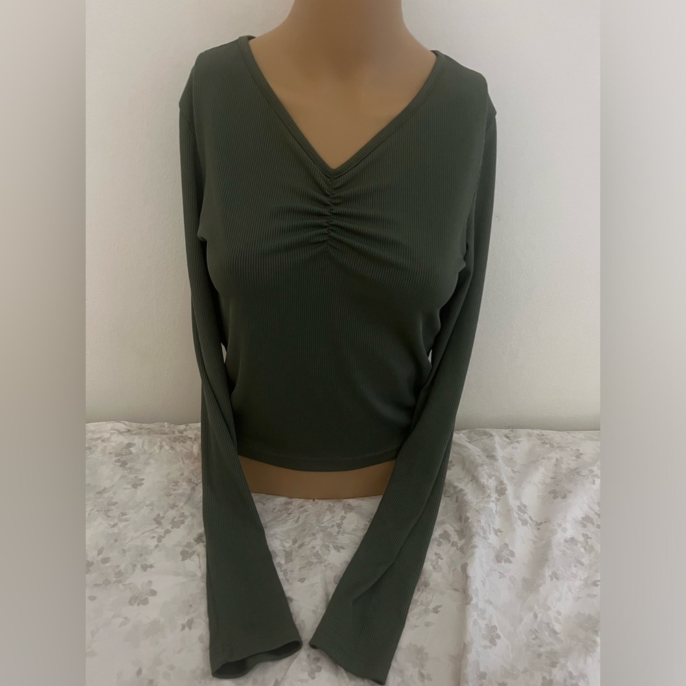 Olive green v neck long sleeve hour glass enhancing top